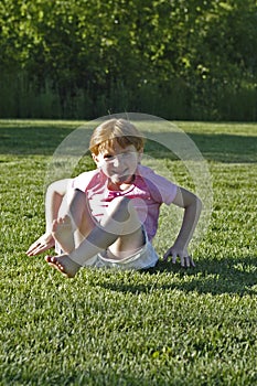 Girl after somersault at park