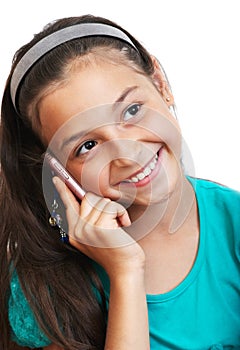 The girl is speaking by phone