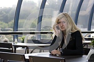 The girl speaking by phone