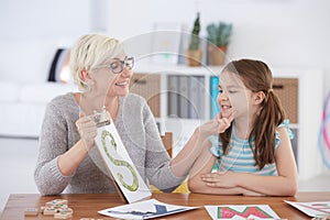 Girl with speech impediment