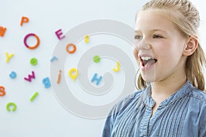 Girl in speech therapy office photo