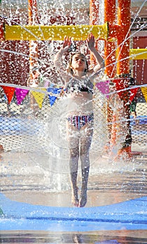 Girl Splashing at Waterpark