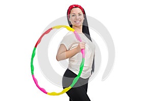 The a girl in sport suit with hula hoop isolated