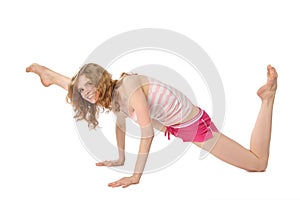 Girl in sportswear makes gymnastic