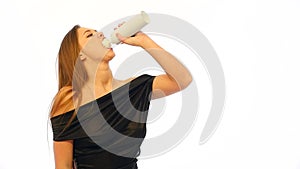 Girl Spraying Whipped Cream into Her Mouth