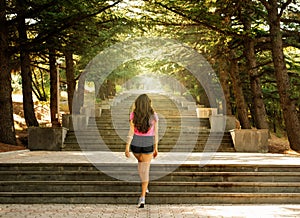 Girl on stairs in the sun