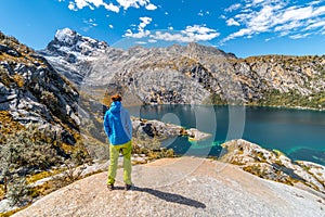 Girl standing above Laguna Churup, acclimatization hike, Huaraz trek, Cordillera Blanca, Peru, South America