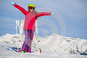 Girl standing with arms spreading wide open.