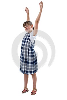 Girl standing with arms up on white bcakground photo