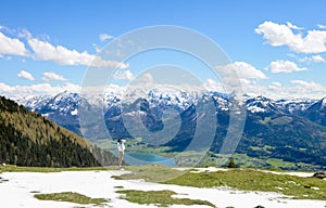 Girl standing around edge of Schafberg mountain, Austria