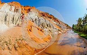 Girl standing on the banks of the fairy stream in Mui Ne vietnam 2