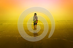 A girl standing at beach