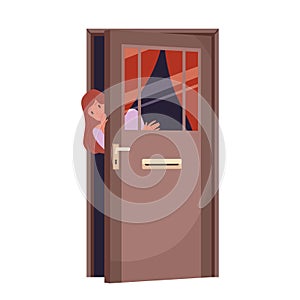 Girl standing behind opening door, looking out, young woman peeking with curiosity