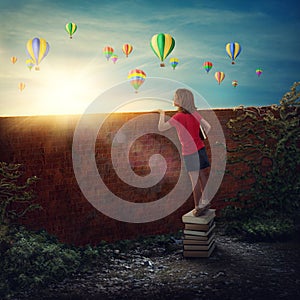 Girl standing on the books