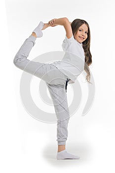 Girl standing doing split