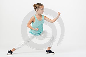 A girl standing in a fighting stance