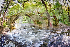 A girl standing by kelefos bridge,cyprus