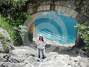 Girl standing next to the adriatic sea