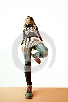 Girl Standing on One Leg