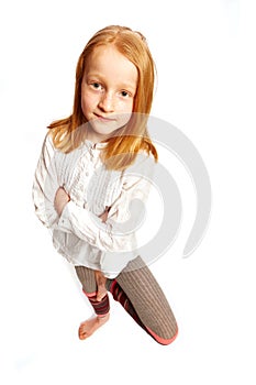 Girl standing on one leg