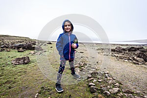 Girl is standing on remains of ancient roman ruins stone