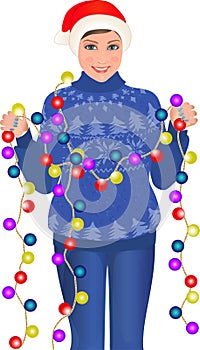 Girl standing in sweater holding garland