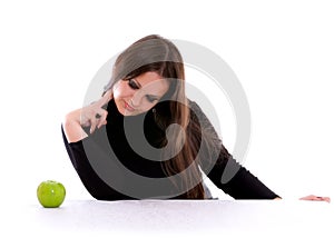 Girl staring at the apple