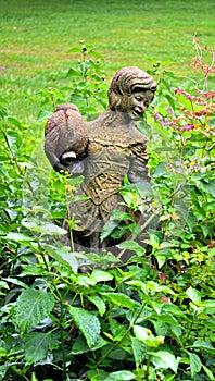 Girl statue in a garden-1