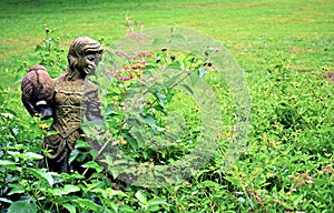 Girl statue in a garden-1