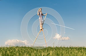 Girl on stilts