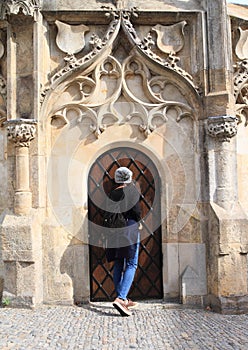 Girl by Stone Fountain in Kutna Hora photo