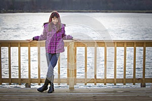 Girl stood by lake photo