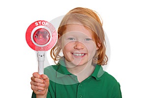 Girl with stop sign