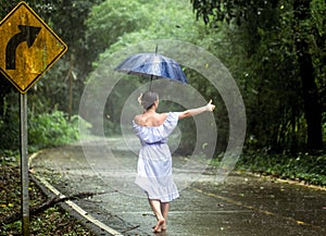 Girl stops the car in the rain