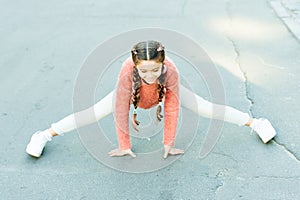 Girl stretching before long walk. Little child enjoy activity. Kid walking running outdoors. Enjoy walk. Sport for kids