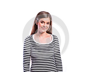 Girl in striped t-shirt, young beautiful woman, studio shot