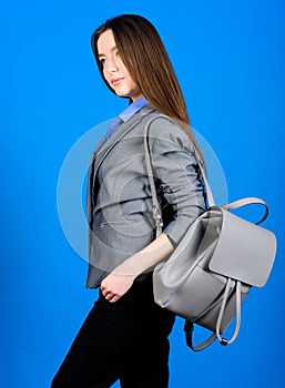 Girl student in formal clothes. Backpack fashion trend. Woman with leather knapsack. Stylish woman in jacket with