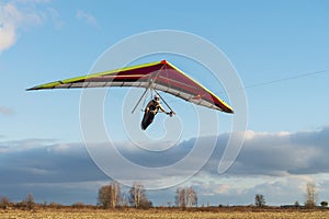 Girl student is mastering hang gliding sport