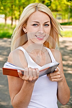 Girl-student reads textbook