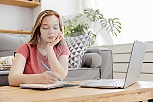girl studies online at home