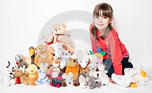 Girl with stuffed animals