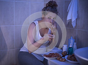 Girl stuffing with spaghetti