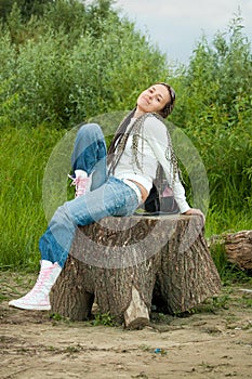 Girl on stump