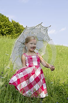 Girl with a summer umbrella