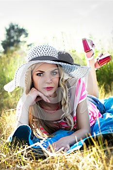 Girl sunbathing on the sun in the nature