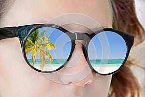 Girl sunglasses, beach reflection, summer concept