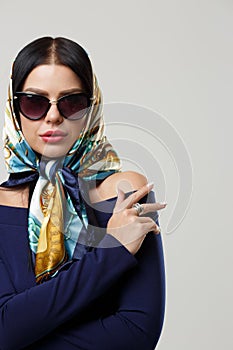 Girl in sunglasses and headscarf