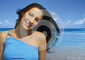 Girl on sunny seashore