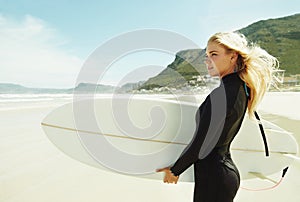 Girl, surfer and holding surfboard in beach, Cape Town and training for surfing sports in nature. Athlete, outdoor and
