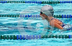 Girl swimming breaststroke